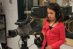 girl with TV camera