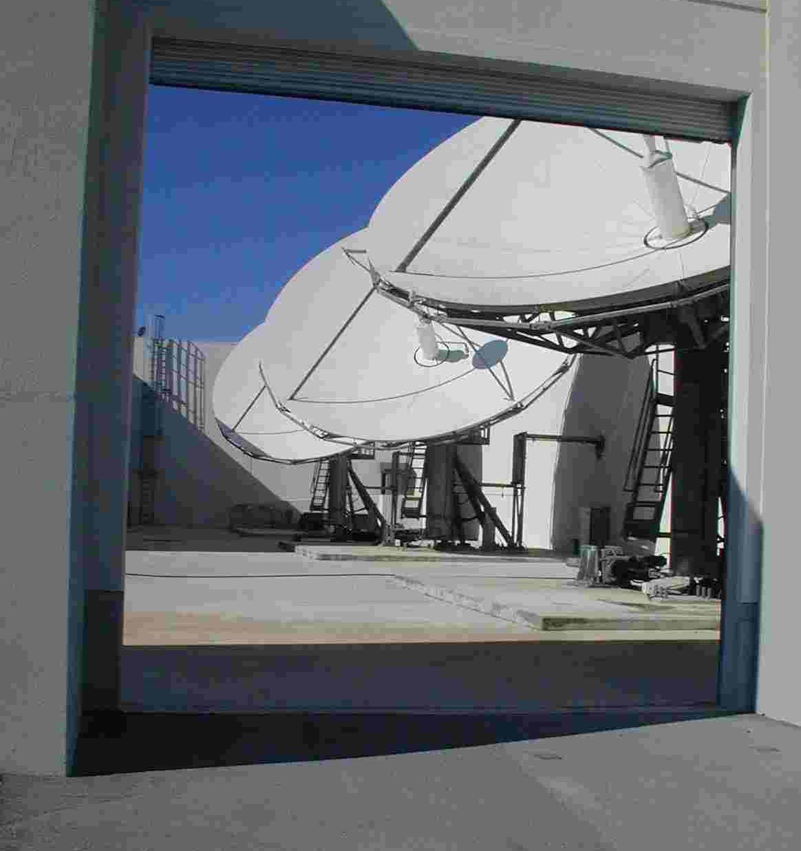 Image of three Vertex 9M antennas in courtyard