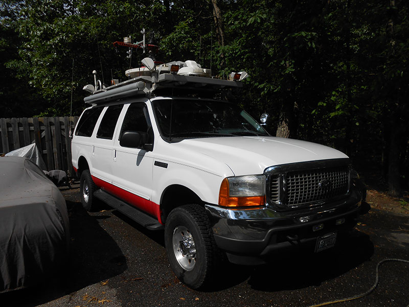 Ford Excursion satellite truck - front view